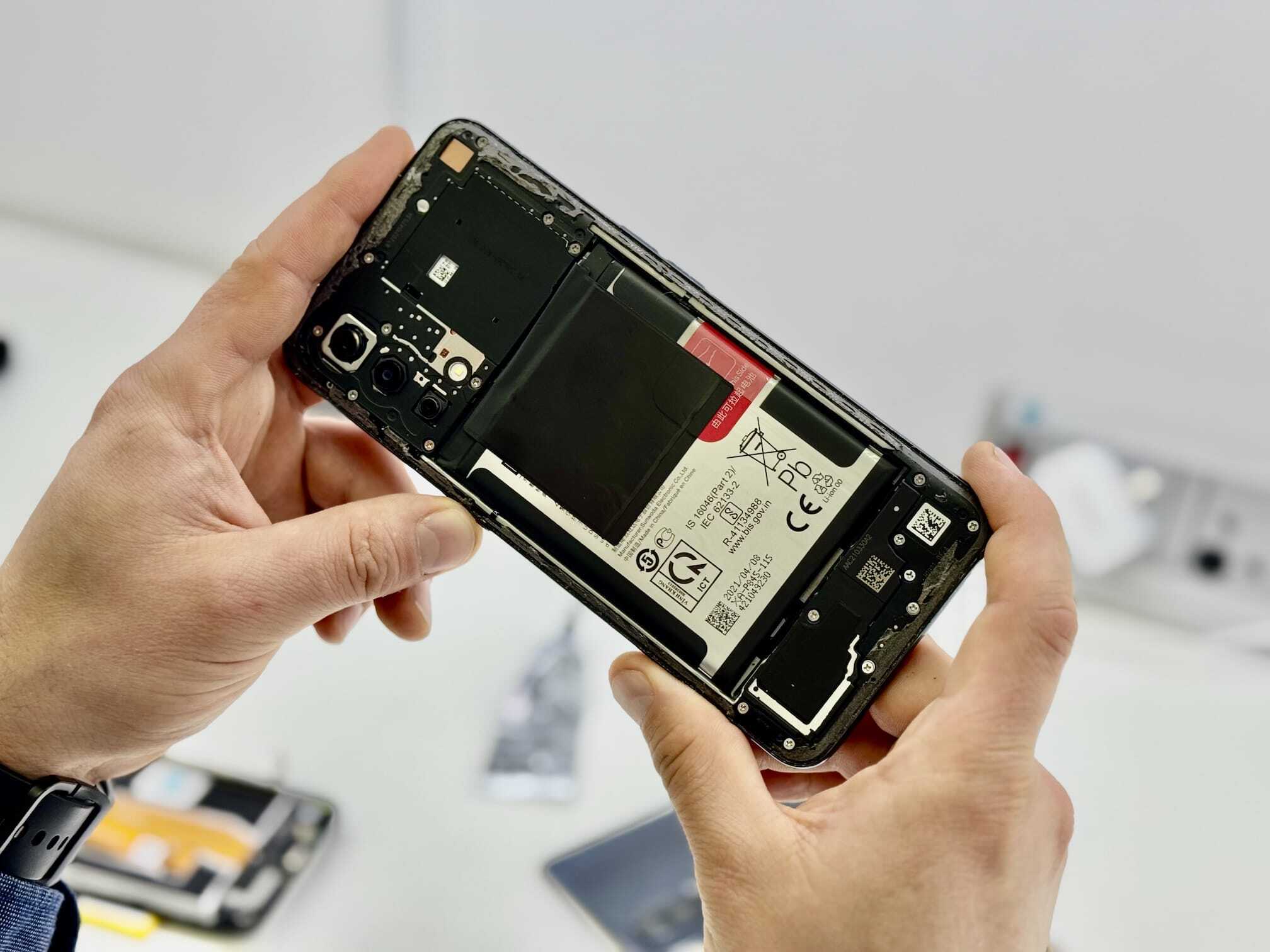 Phone back cover removed for battery access
